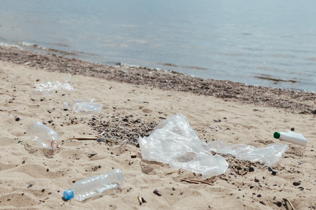 Plastic trash on the sand
